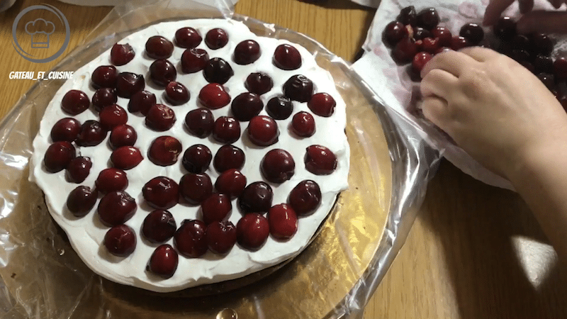 Black forest montage with whipped cream and cherries