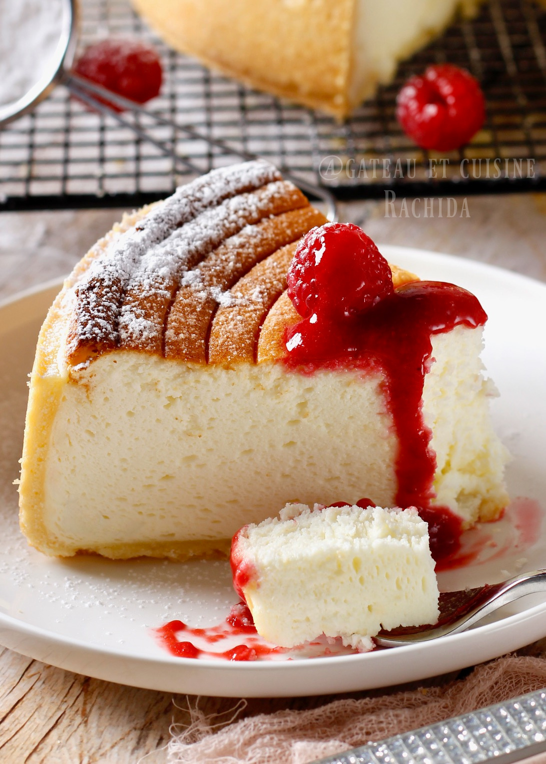 German cheesecake (Käsekuchen) slice served with berry sauce