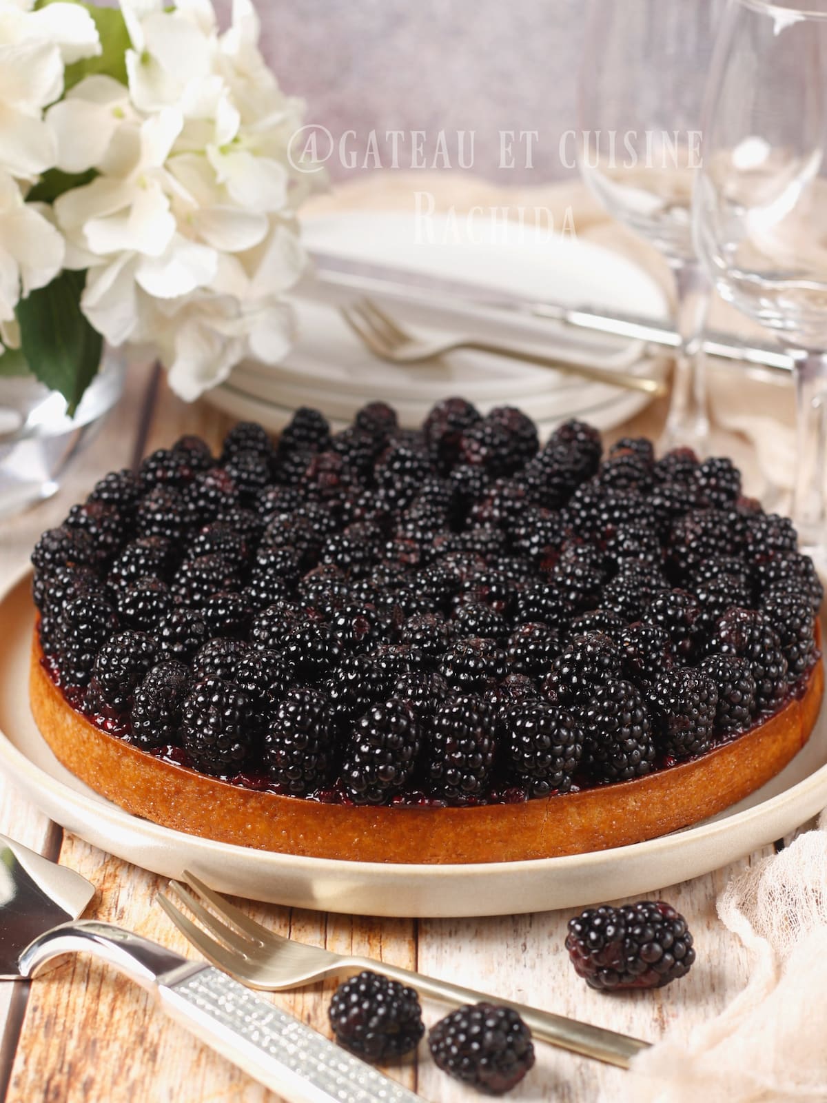 Blackberry tart with almond cream pastry and blackberry confit