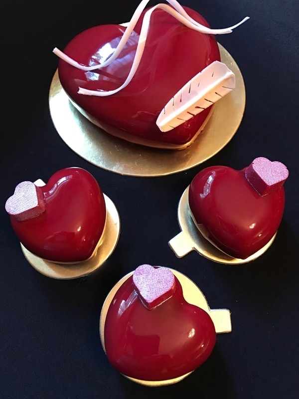 Romantic Valentine’s Day chocolate and passion fruit heart dessert